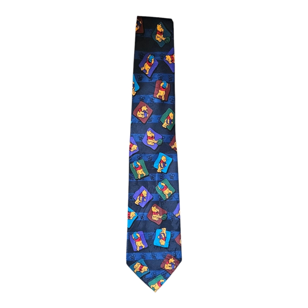 This vintage Winnie the Pooh tie is a must-have for any Disney fan. The tie feat